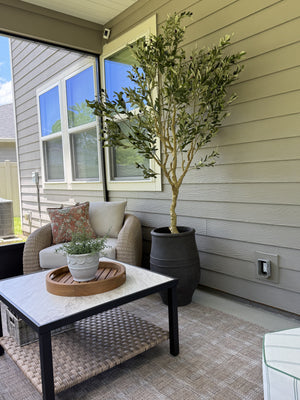 Spruce Up Your Patio: How an Artificial Olive Tree Can Transform Your Outdoor Space